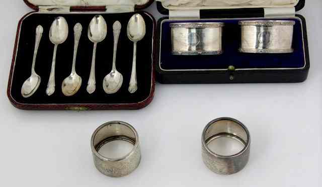 Appraisal: A pair of Victorian silver napkin rings London engraved birds