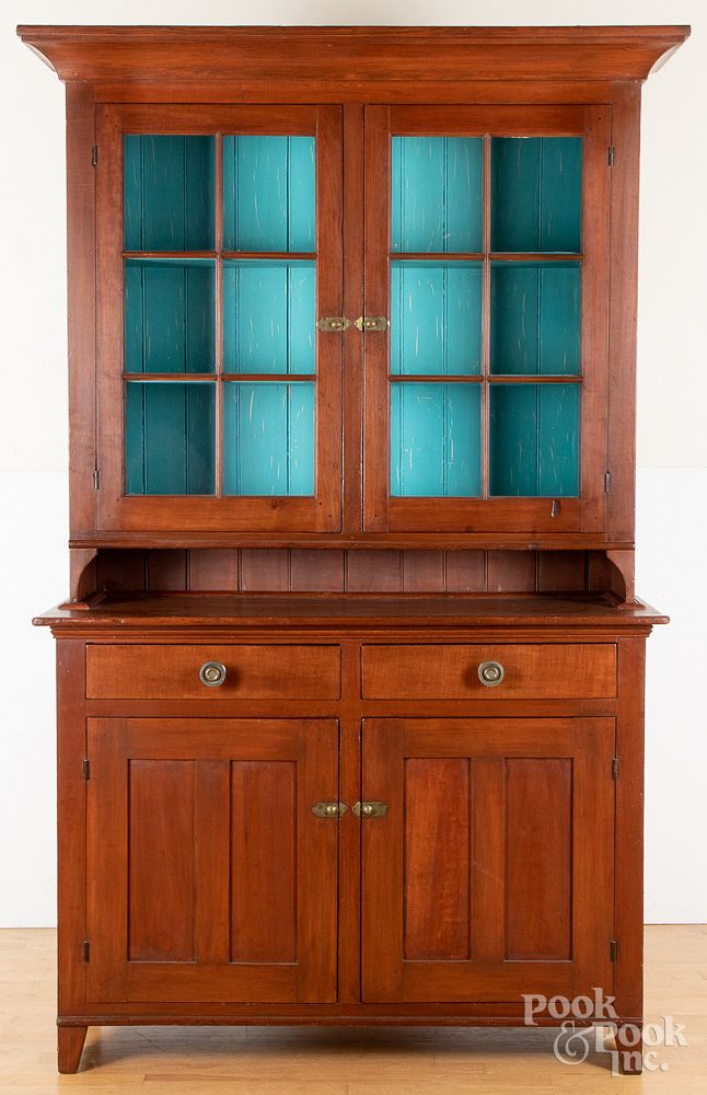 Appraisal: Pennsylvania two-part Dutch cupboard Pennsylvania pine and maple two-part Dutch