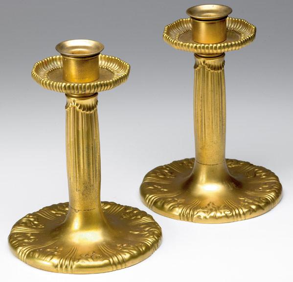 Appraisal: TIFFANY STUDIOS Pair of gold dore candlesticks embossed with flames