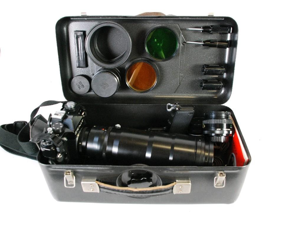 Appraisal: ZENIT S mm SLR CAMERA OUTFIT contained in a fitted