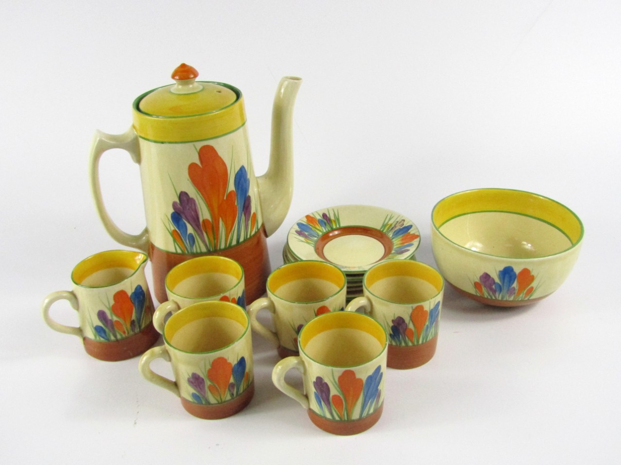 Appraisal: A Clarice Cliff pottery part coffee service decorated in the