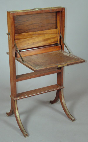 Appraisal: A Regency mahogany and birdseye maple upright ladies writing desk