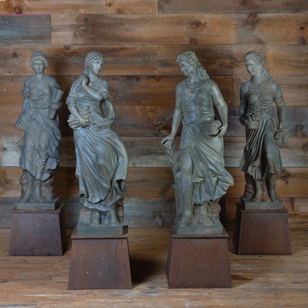 Appraisal: Group of Four Painted Cast Iron Figures Representing the Four