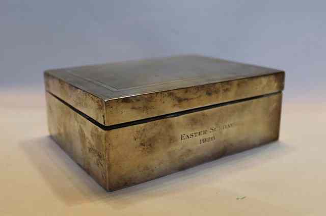 Appraisal: A SILVER CIGARETTE BOX of rectangular form with engine turned