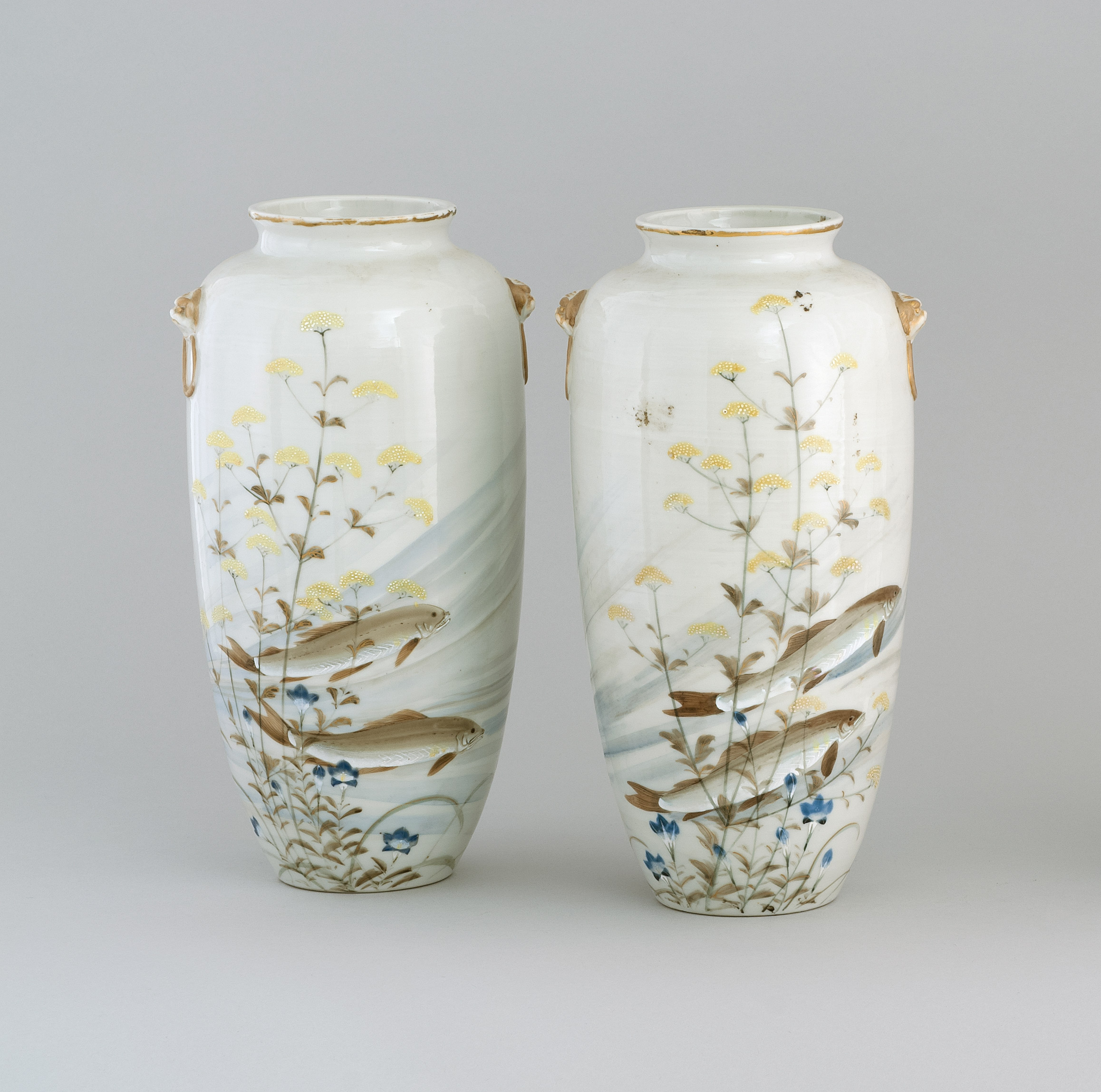 Appraisal: PAIR OF PORCELAIN VASES Meiji PeriodIn seed form with lion's-head