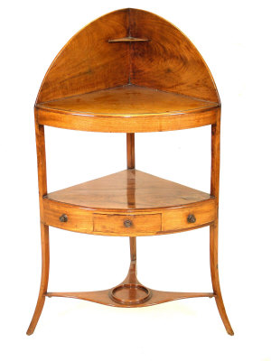 Appraisal: A Georgian mahogany corner washstand the raised back with short