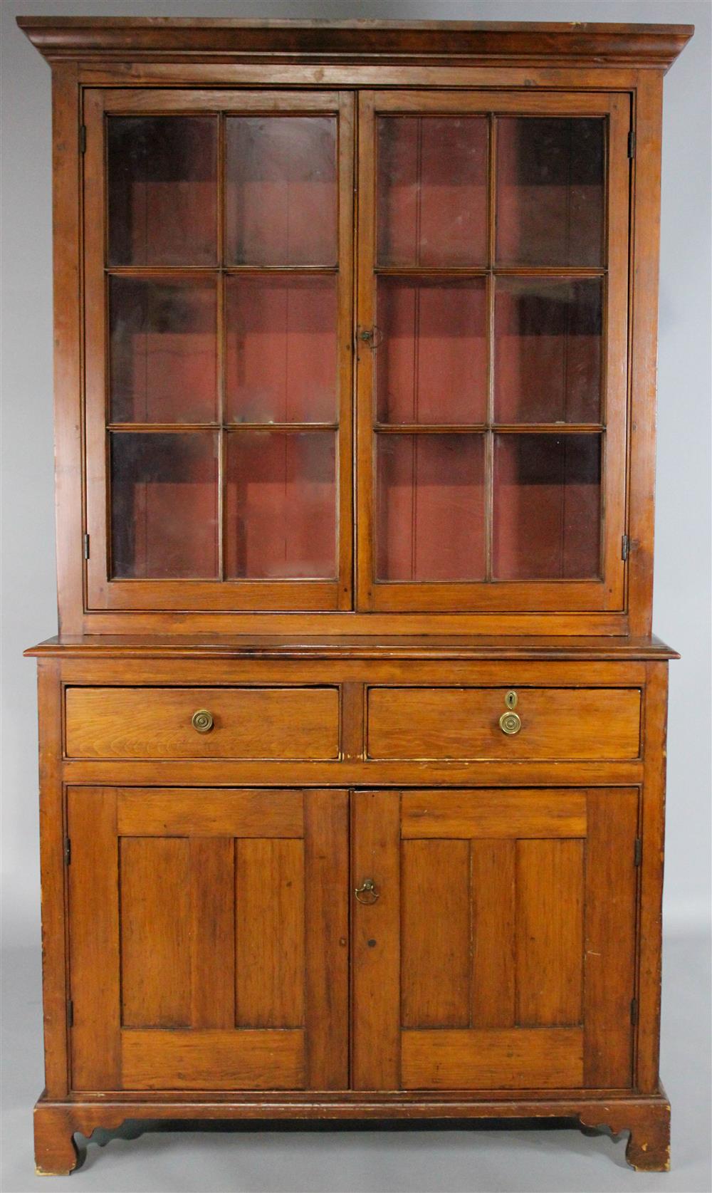 Appraisal: AMERICAN SHERATON STAINED PINE STEP BACK CUPBOARD in two parts