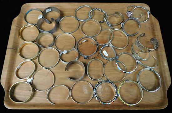 Appraisal: JEWELRY Large collection of bangle and cuff bracelets mostly sterling