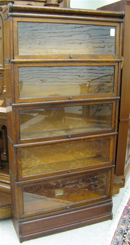 Appraisal: STACKING OAK BOOKCASE American early th century with five stacking