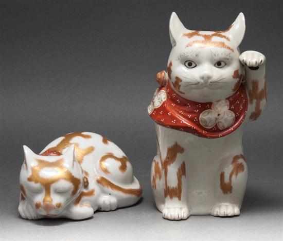 Appraisal: Two Japanese porcelain cats th century parcel-gilt decoration figure of