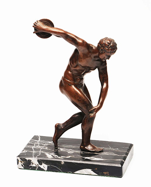 Appraisal: A BRONZED SCULPTURE of a discus thrower mounted on a