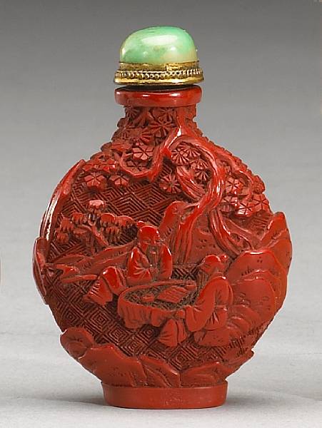 Appraisal: A carved cinnabar lacquer snuff bottle th Century Decorated with