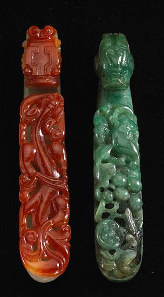 Appraisal: Two jadeite belt hooks Both featuring a dragon-headed hook facing