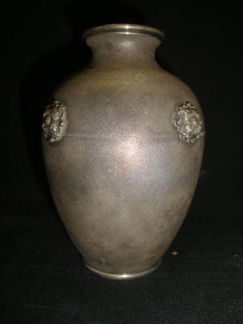 Appraisal: BUCCELLATI Hand-Chased Silver Vase with Segrinato finish flared neck and