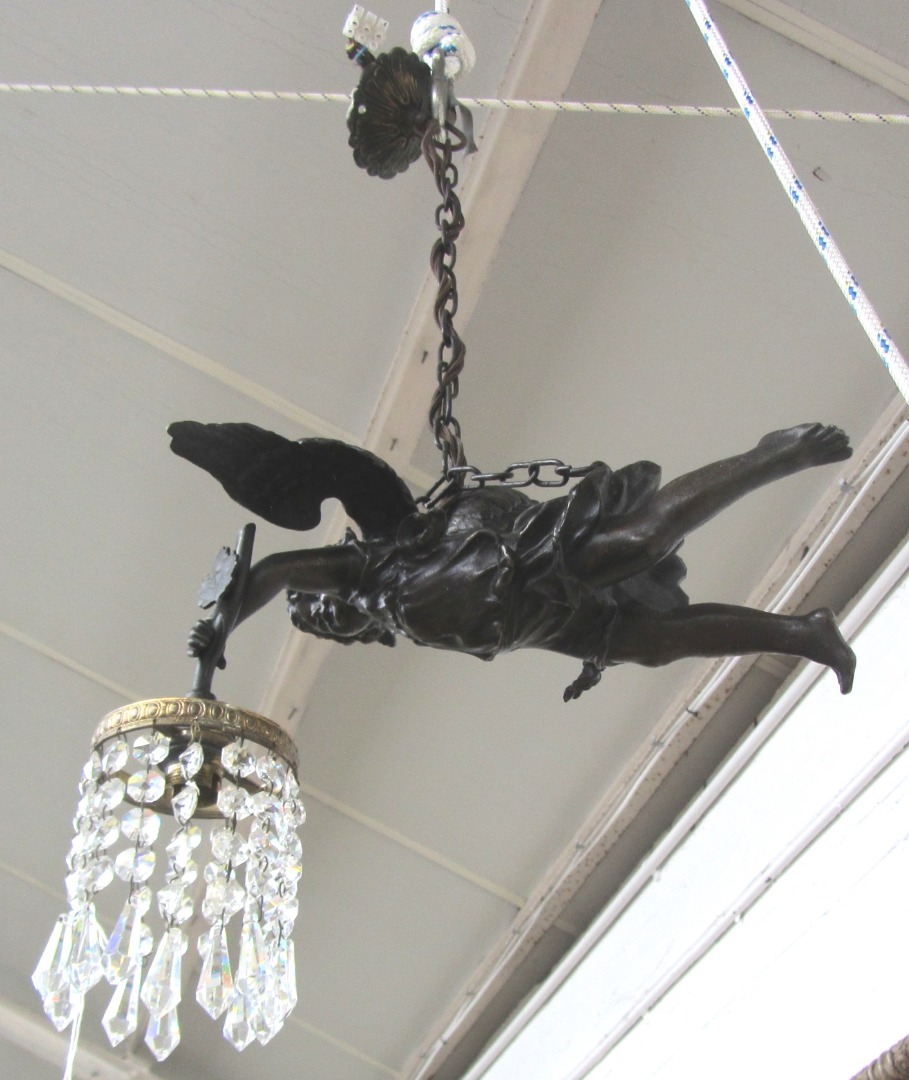 Appraisal: A patinated spelter figural ceiling light early th century modelled