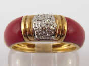 Appraisal: A yellow metal tests gold red stone and diamond ring