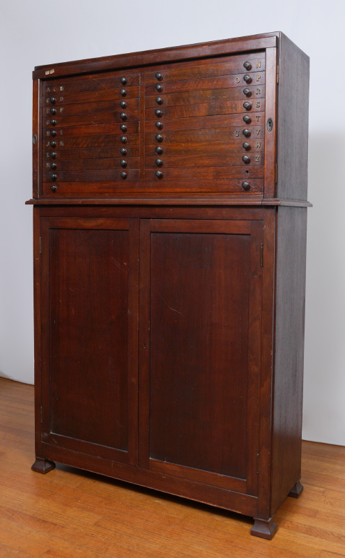 Appraisal: OAK PRINTERS CABINET Top section with half drawers over single