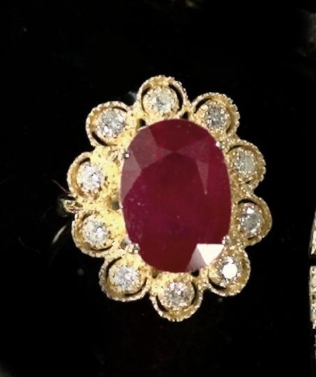 Appraisal: Stunning Fourteen-Karat Yellow Gold Diamond and Ruby Lady's Ring composed