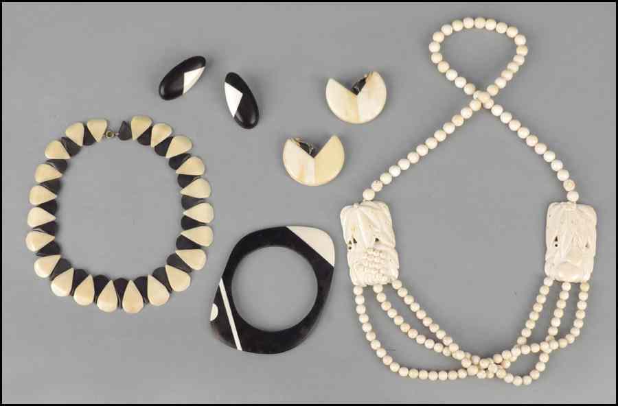 Appraisal: CARVED IVORY NECKLACE Together with a carved bone and wood