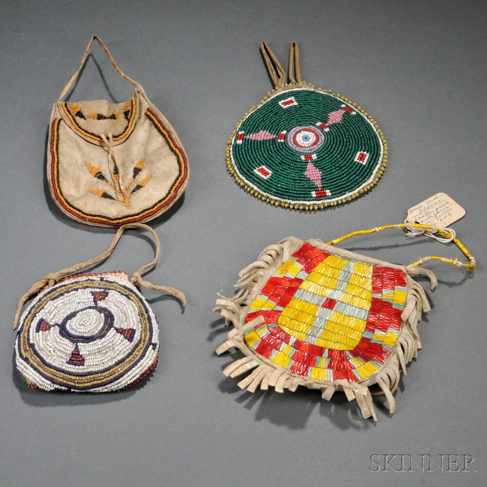 Appraisal: Four Plains Hide Pouches three with beadwork on one side