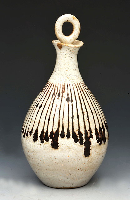 Appraisal: Lucie Rie Austrian - Oil jar and stopper dripped glaze