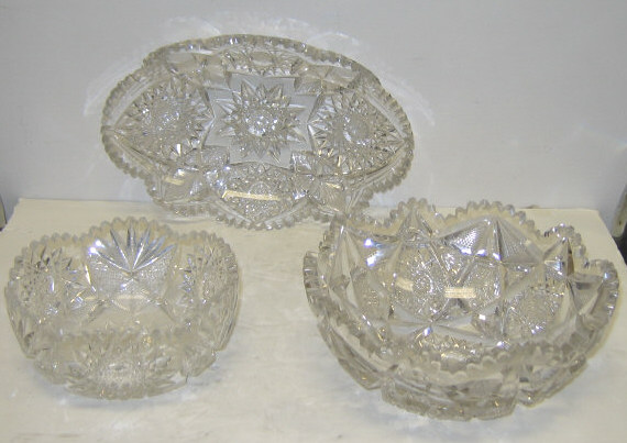 Appraisal: THREE CUT GLASS SERVING PIECES Two fruit bowls and oval