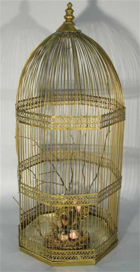 Appraisal: VICTORIAN STYLE BRASS BIRDCAGE Of tall pointed form with slender