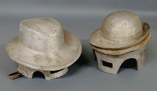 Appraisal: Two French Deco hat molds cast aluminum Approx h x