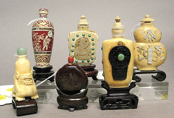 Appraisal: A group of six ivory bone and nut snuff bottles