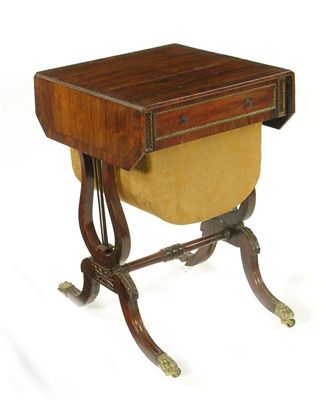 Appraisal: A George IV rosewood sewing table the crossbanded top with