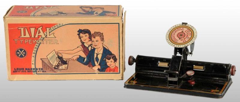 Appraisal: Early Marx Dial Typewriter Toy Description American Some wear throughout