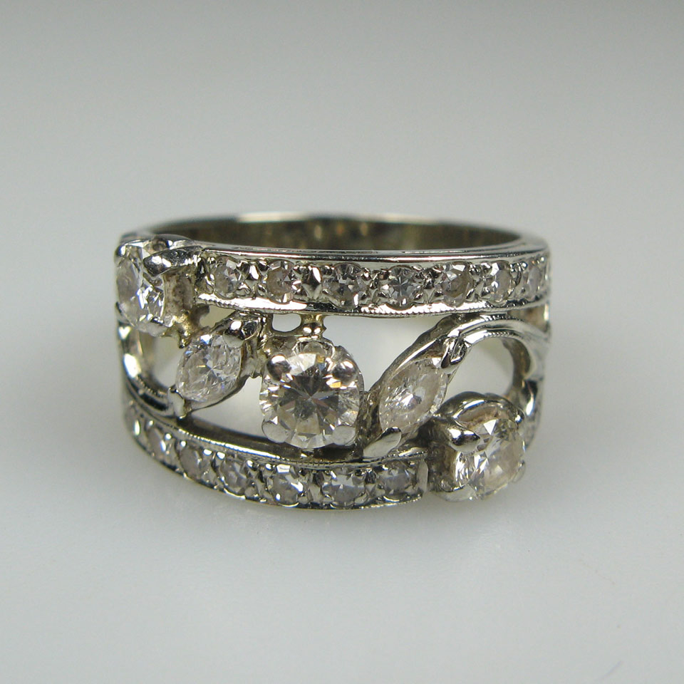 Appraisal: k White Gold Filigree Ring set with brilliant cut marquis