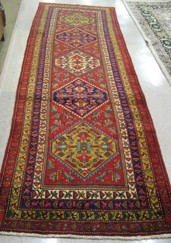 Appraisal: PERSIAN HALL CARPET Heriz district Azerbaijan province eastern Iran the