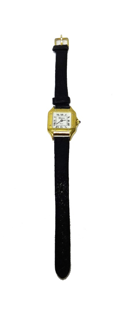 Appraisal: A lady's ct gold curved square cased Geneve Quartz wristwatch