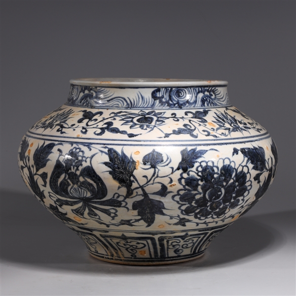 Appraisal: Chinese blue and glazed ceramic vessel with floral designs to