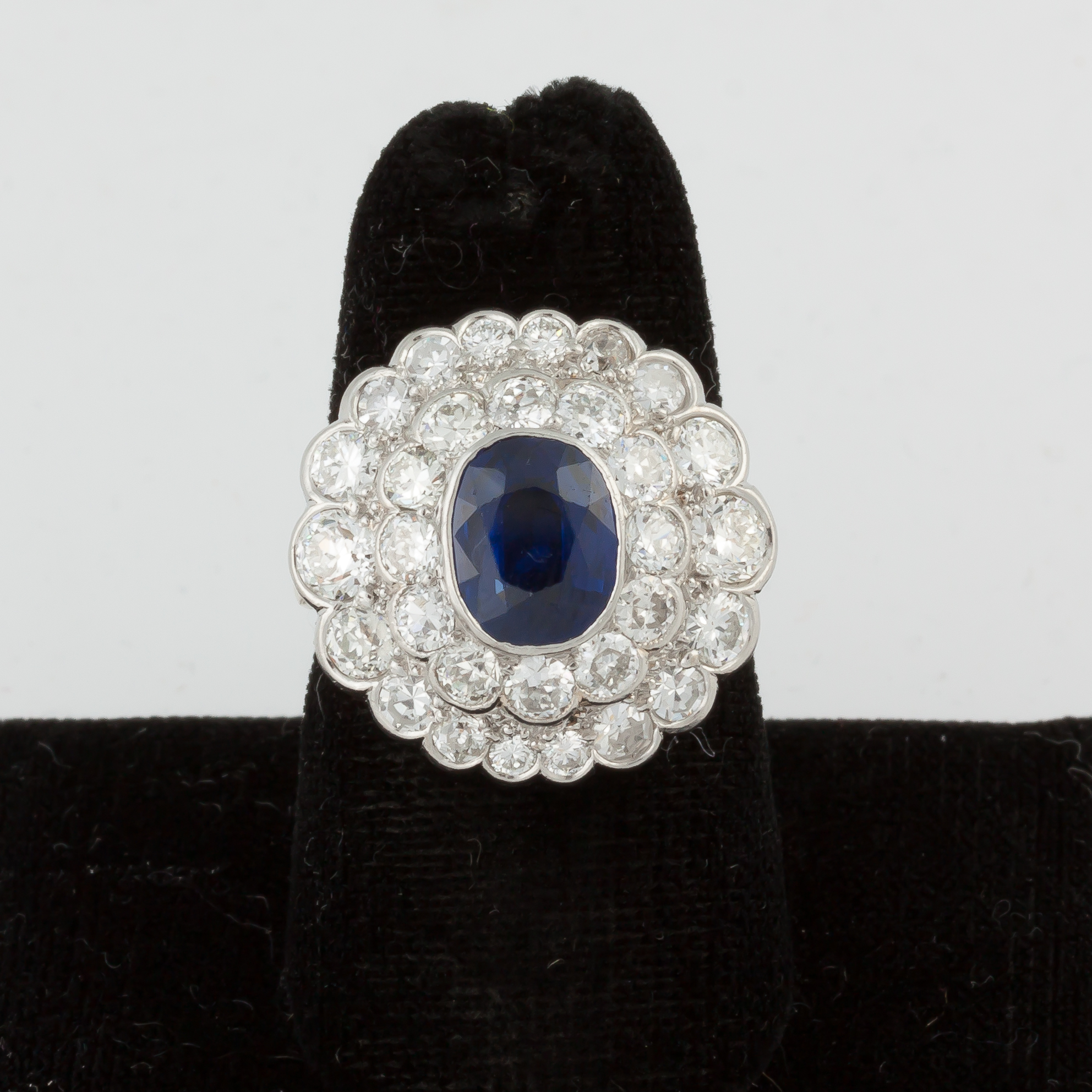 Appraisal: Teufel K Sapphire and Diamond Ring Oval faceted natural blue