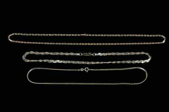 Appraisal: THREE K YELLOW GOLD CHAINS One of flattened ''S'' links