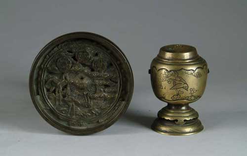 Appraisal: TWO ORIENTAL BRONZE INCENSE BURNERS Disc shaped Oriental incense holder