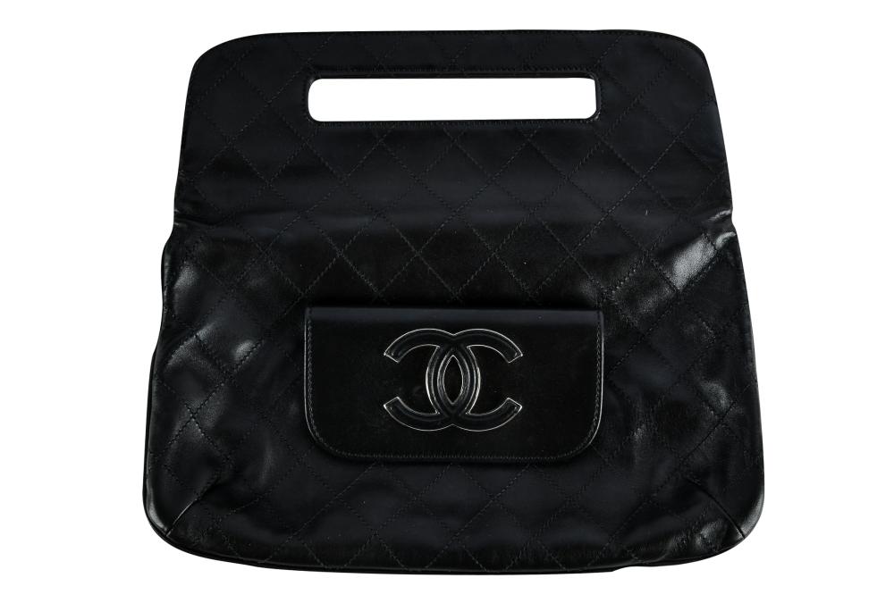 Appraisal: CHANEL BLACK QUILTED CLUTCHcirca with authenticity card and sticker no