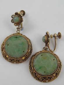 Appraisal: A pair of gilt metal tests silver and jadeite jade