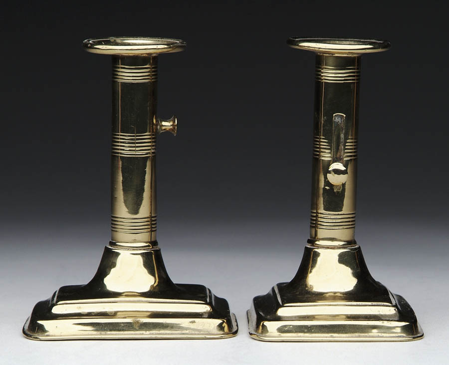 Appraisal: PAIR OF SQUARE BASE BRASS CANDLESTICKS Bottoms filled and marked