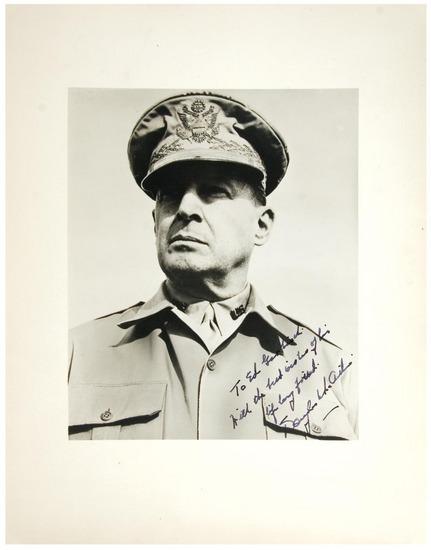 Appraisal: MACARTHUR Douglas Signed photograph inscribed to Ed Garbisch With the