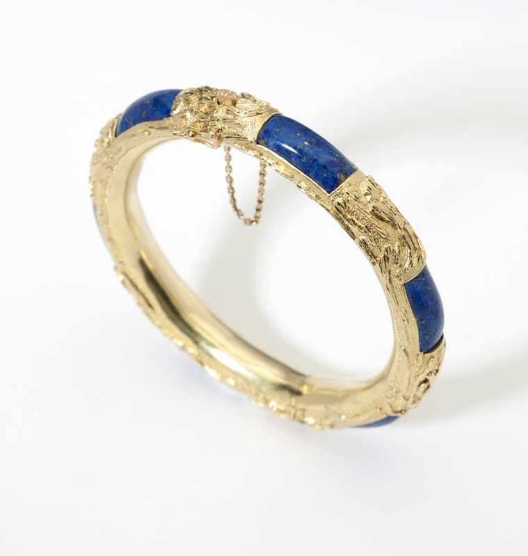 Appraisal: A gold and lapis lazuli bangle K gold gms size