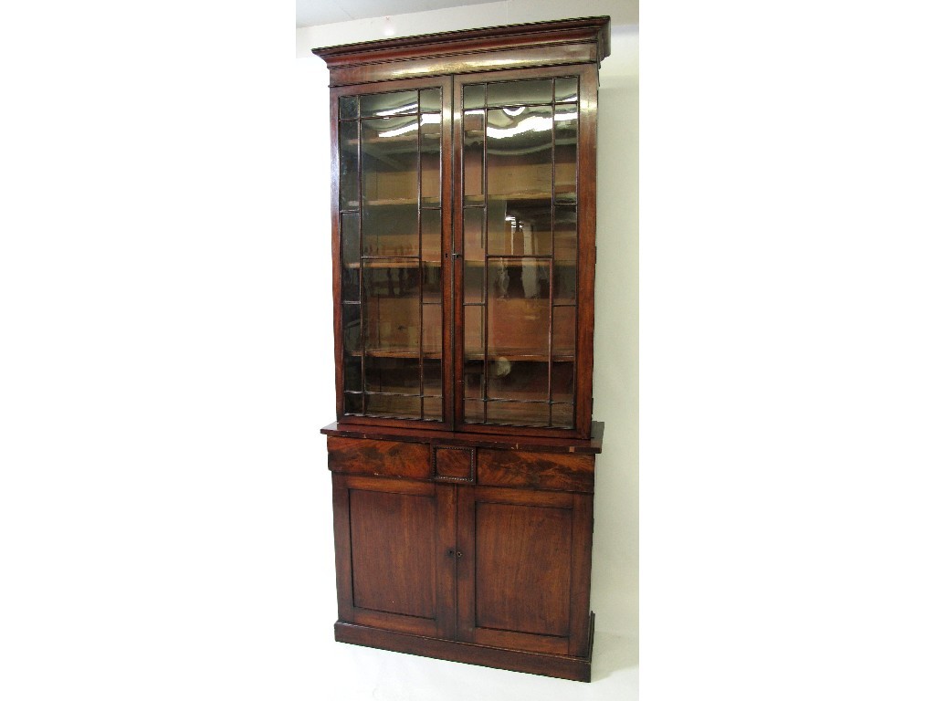 Appraisal: A William IV mahogany bookcase on chiffonier base the moulded