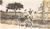 Appraisal: BICYCLING GRAND TOUR Album containing photographs shot and sequenced by