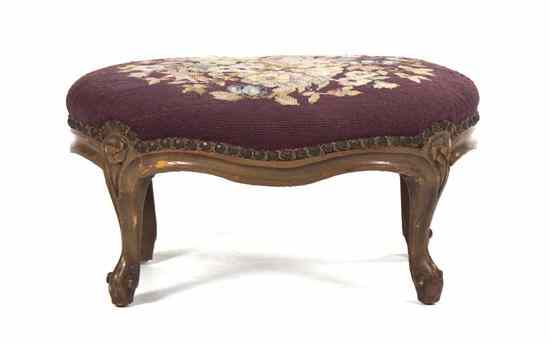 Appraisal: A Louis XV Style Ottoman having an oval needlepoint upholstered