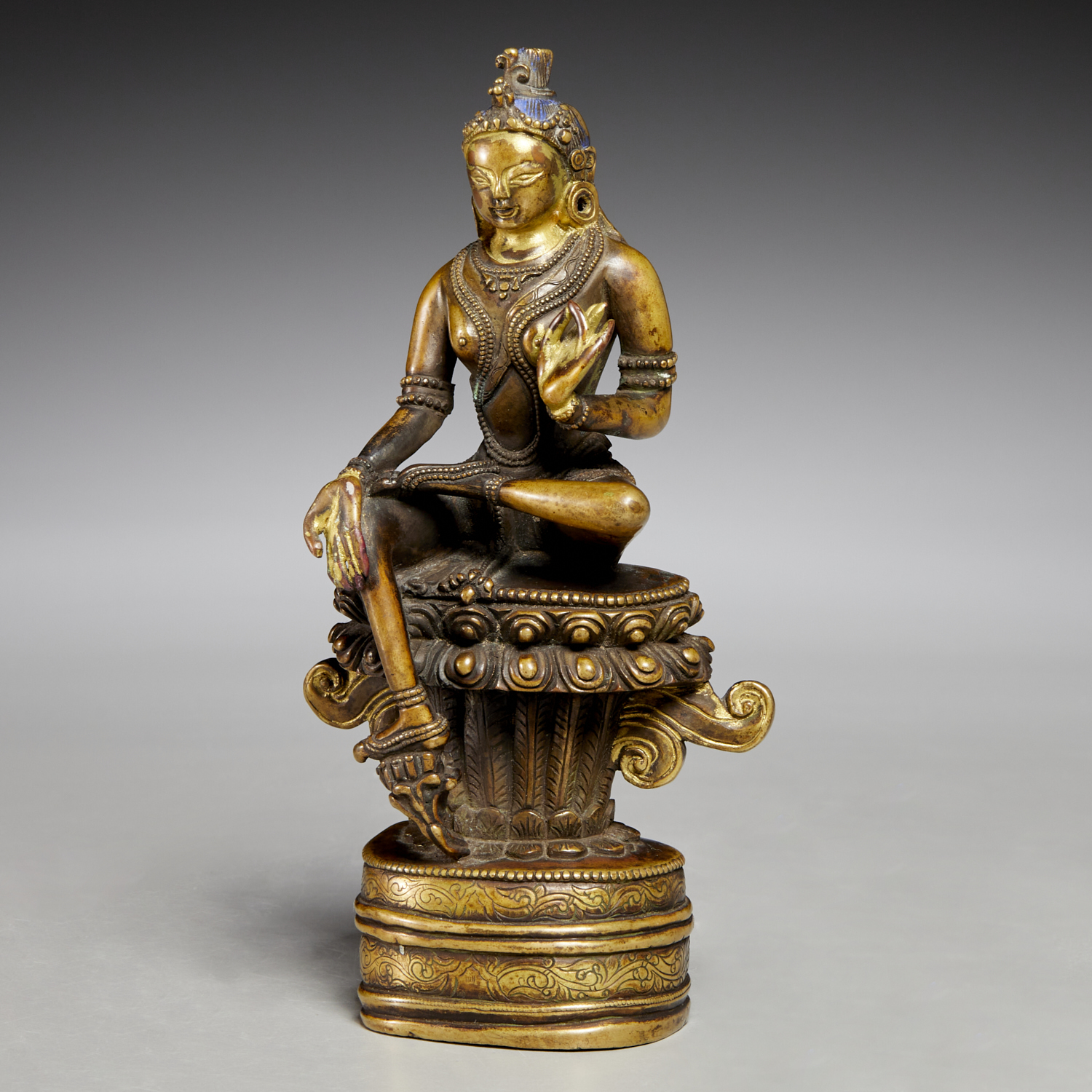 Appraisal: SMALL SINO-TIBETAN GILT BRONZE TARA BUDDHA Likely th c or