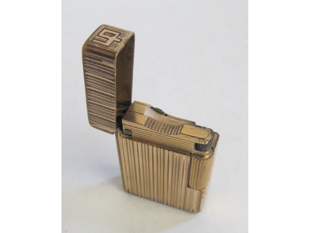 Appraisal: Gilt metal cigarette lighter by Dupont Paris