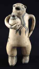 Appraisal: COCHITI EFFIGY POTTERY FIGURE Cream colored pottery figurine with partial