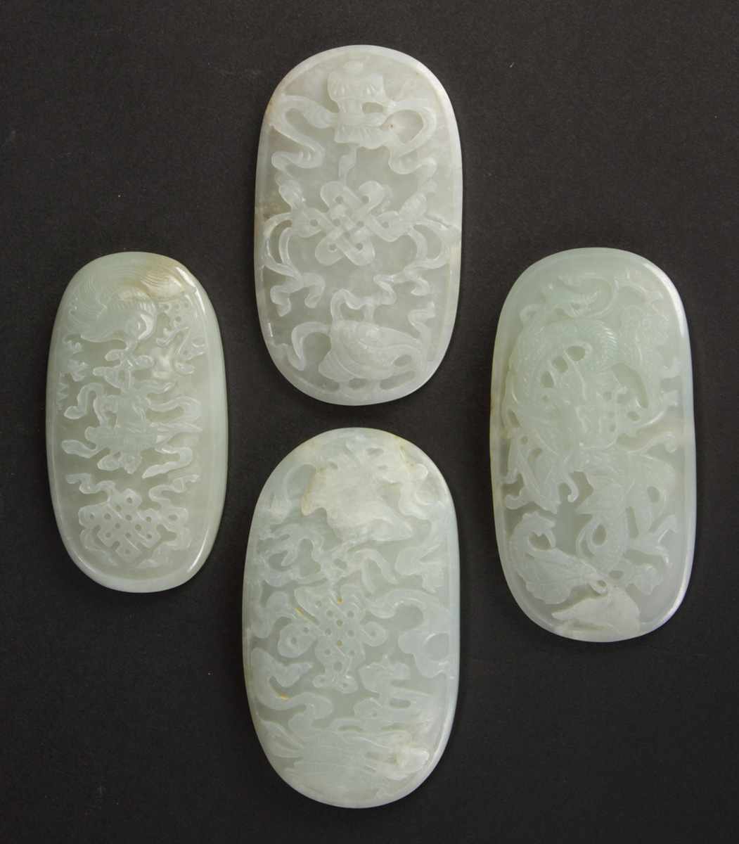 Appraisal: Chinese Carved White Jade Plaques Various designs incl endless knots